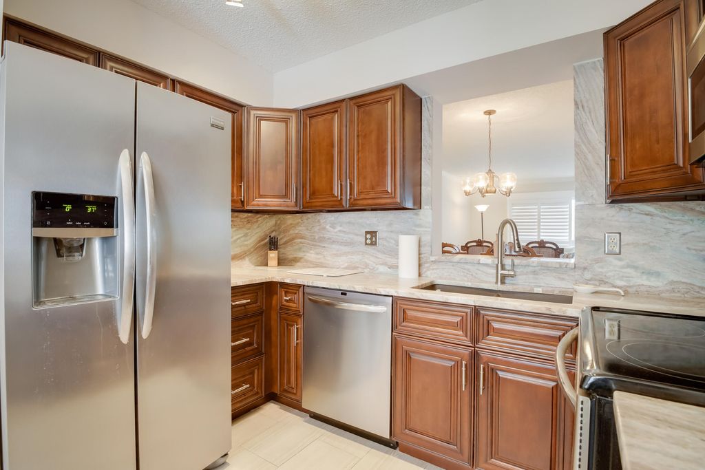 Photo of 7321 Amberly Lane #405, Delray Beach, FL 33446 (MLS # R11162529)