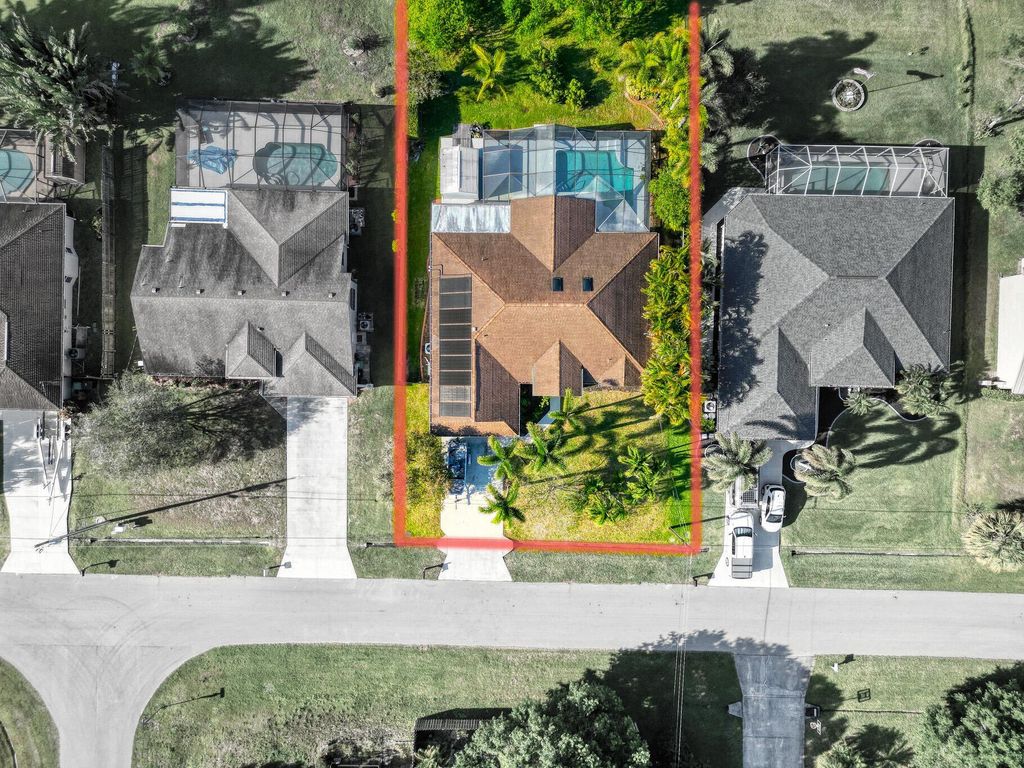 Photo of 139 NE Royce Avenue, Port Saint Lucie, FL 34983 (MLS # R11090788)