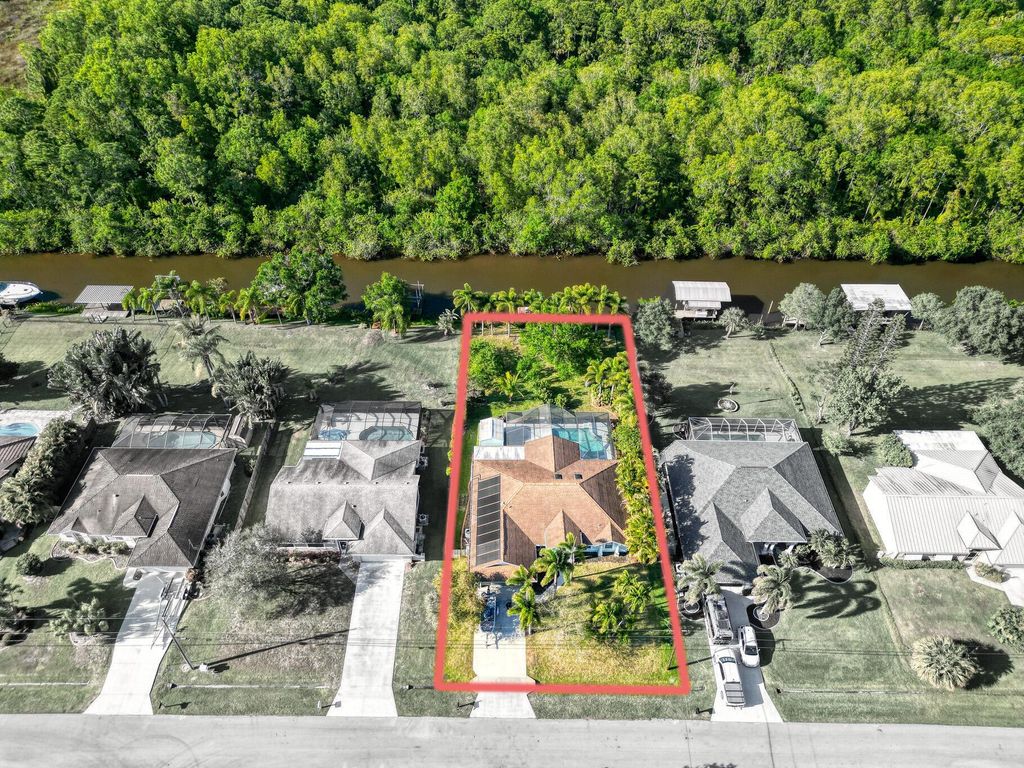 Photo of 139 NE Royce Avenue, Port Saint Lucie, FL 34983 (MLS # R11090788)