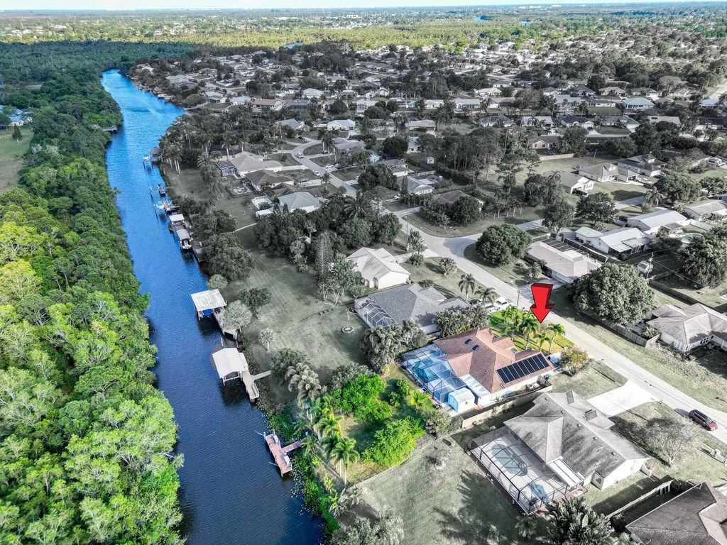 Photo of 139 NE Royce Avenue, Port Saint Lucie, FL 34983 (MLS # R11090788)