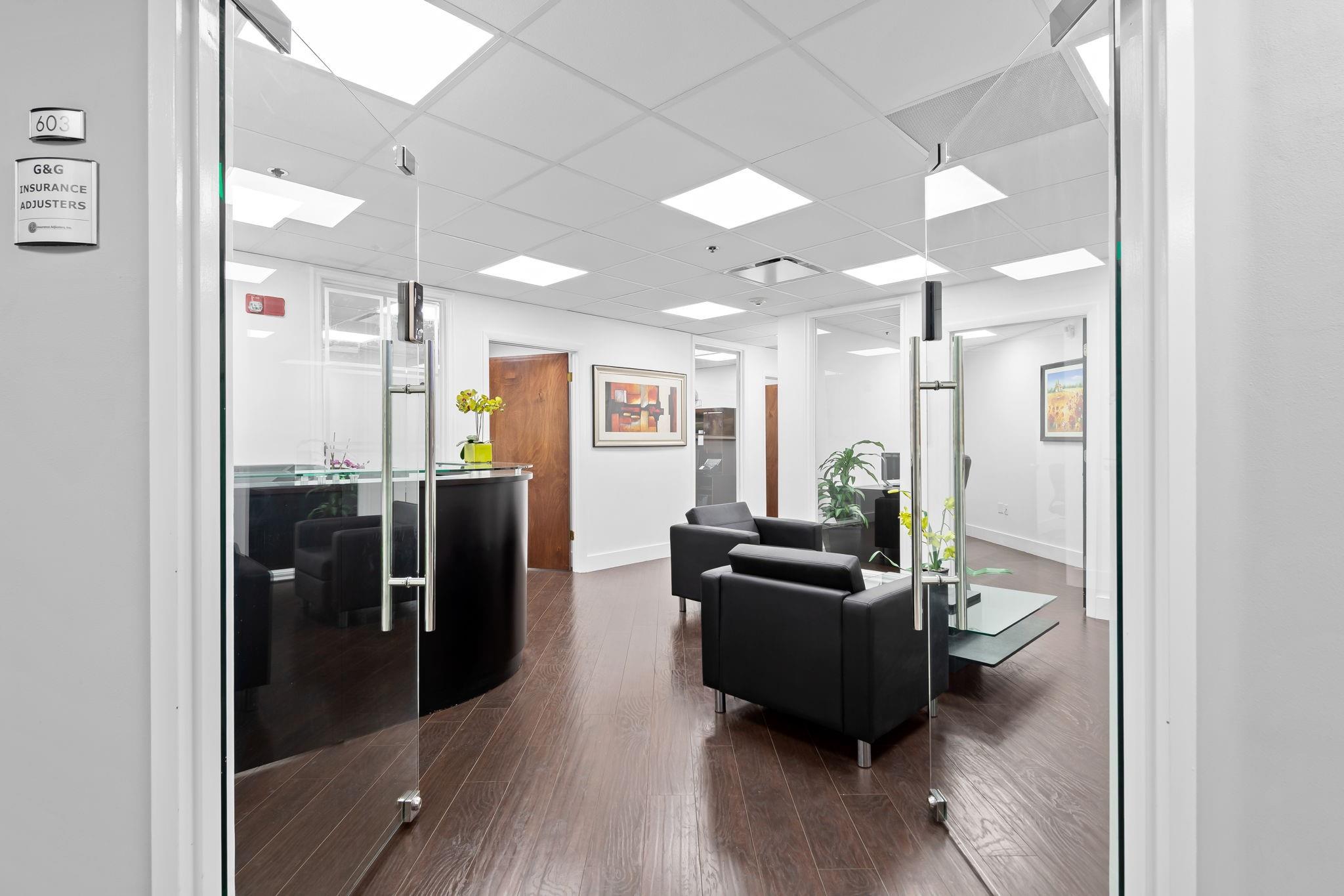 Located in the heart of Fort Lauderdale’s vibrant Las Olas area, this turnkey office condo on the 6th floor offers a rare opportunity for a business seeking a professional, fully furnished workspace in a prestigious setting. The space features elegant dark wood flooring, sleek glass partition walls, and modern finishes throughout, creating a polished and welcoming environment for both clients and employees.
The layout is thoughtfully designed, including a reception area, private offices, a conference room, and open workspaces, allowing for immediate functionality without the need for build-out. Large windows flood the office with natural light and provide views of the surrounding cityscape.