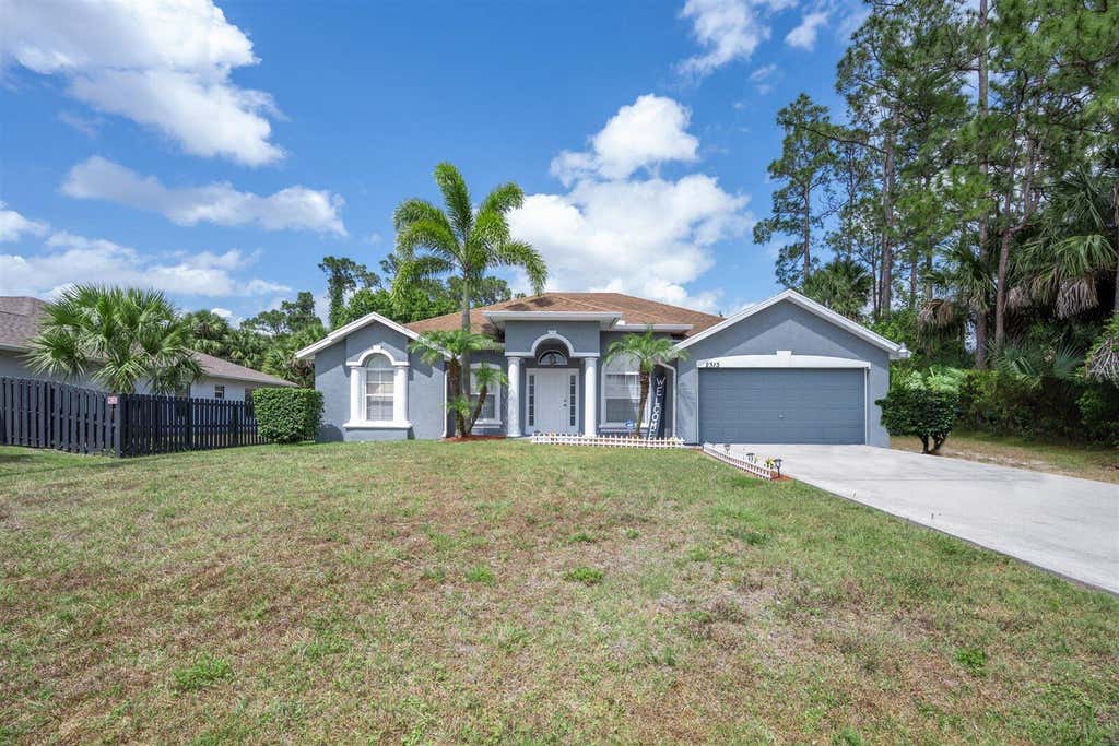 Photo of 2313 SW Import Drive Dr, Port St Lucie, FL 34953 (MLS # R10799232)