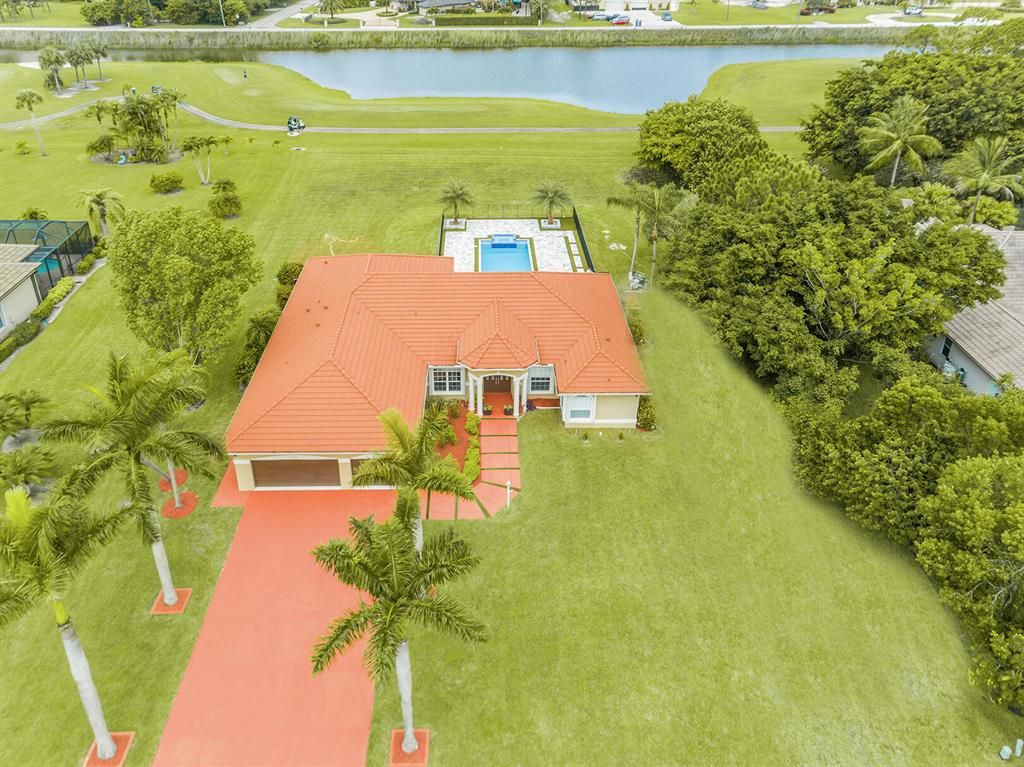 Photo of 8799 Marlamoor Lane, Palm Beach Gardens, FL 33412 (MLS # R10743709)