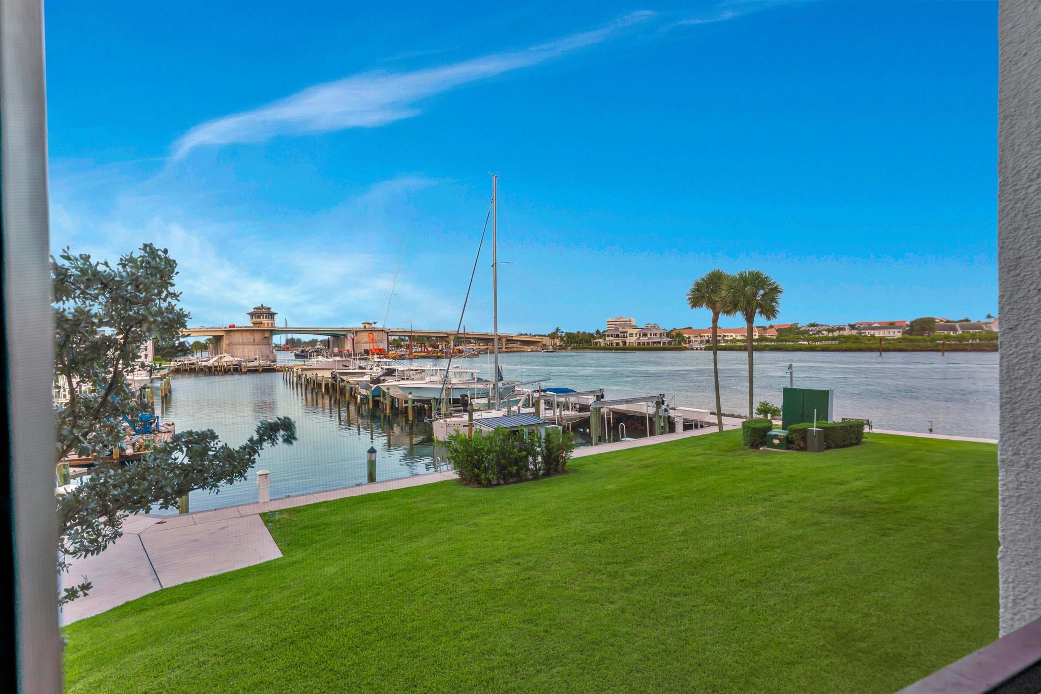 Highly desirable corner unit in the sought-after Jupiter Cove. Enjoy the lifestyle with stunning ocean and intracoastal views upon entering the condo. Brand new porcelain tile throughout and a new chef's dream kitchen with brand new high-end cabinetry and quartz countertops. This meticulously maintained condo offers abundant natural light, freshly painted interior, a spacious floor plan with an additional den/office that can be used as a 3rd bedroom, and resort-style amenities. Spacious master BR with walk in-closet. The amenities include tennis courts, gym, dining area in the clubhouse, property manager onsite, gated community, marina on-site, pickle ball, large size pool, and Pelican Park. Enjoy living in the heart of Jupiter with easy access to dining, shopping, and endless views.