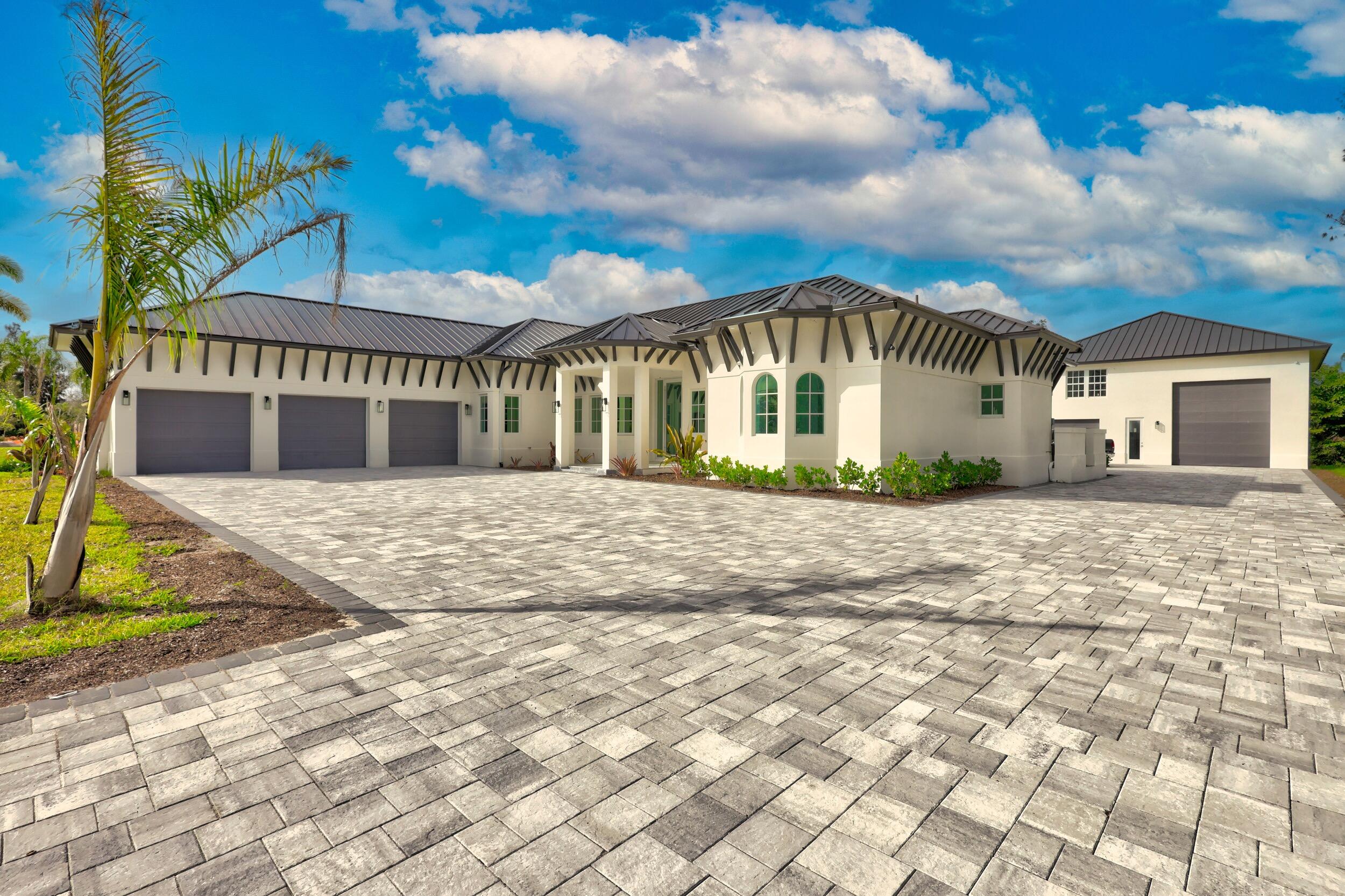 **Home is Built and ready for it's New owner**Stunning custom built 6 bed 6 bath Estate Home with ''smart home'' technology, guest house and a 40x40 RV/Boat Garage! This 6k+ sqft home was designed and built by an elite builder for their own personal residence, so no corners were cut or expenses spared. This home has been equipped with top of the line smart home technology. An iPad control panel will be used to control the entire home. You can also control the home from your phone. This technology allows you to turn on all the lights from your iPad, change the temperature on the AC, lock your doors, close your garage or open your power blinds. You can also control the music that is playing through the speakers that are located in every room.