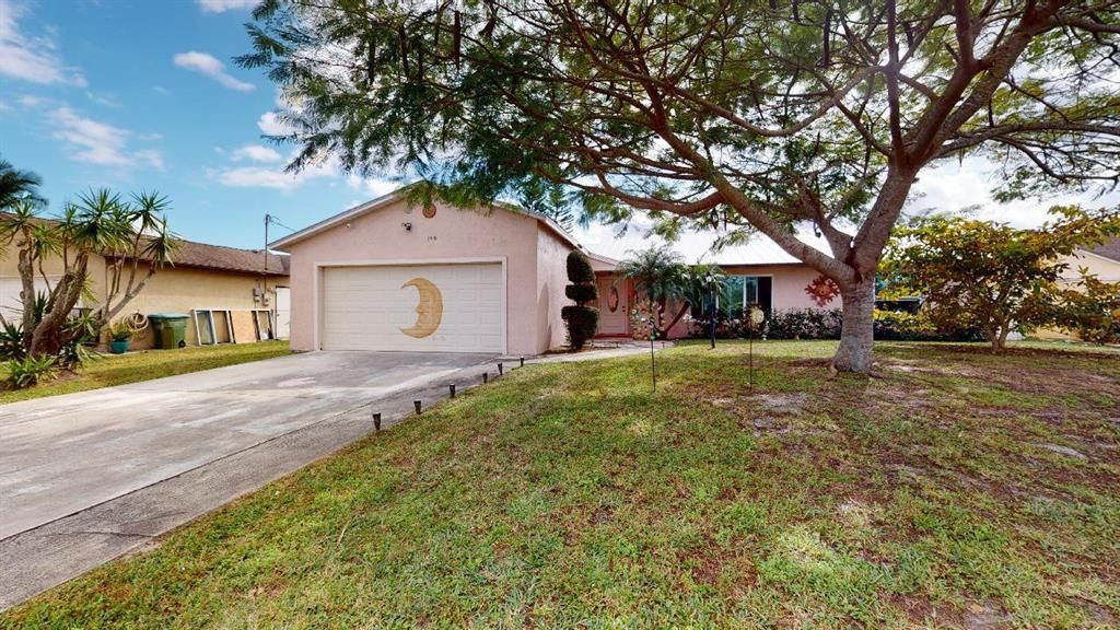 Photo of 148 NE Sagamore Terrace NE, Port Saint Lucie, FL 34983 (MLS # R10766569)