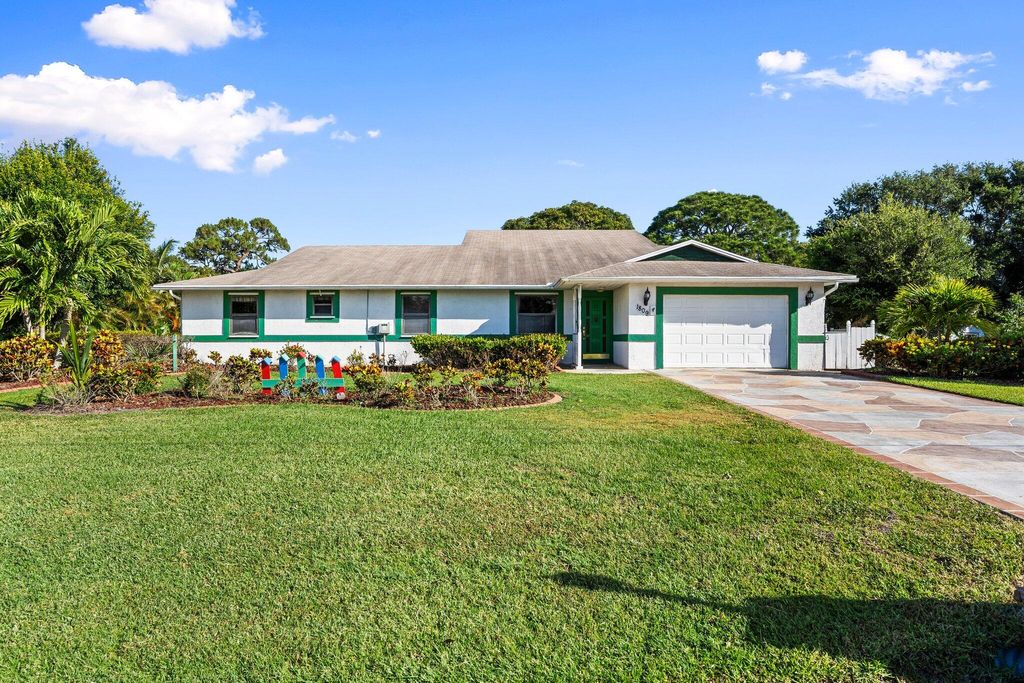 Photo of 1809 SE Deming Avenue, Port Saint Lucie, FL 34952 (MLS # R11091312)