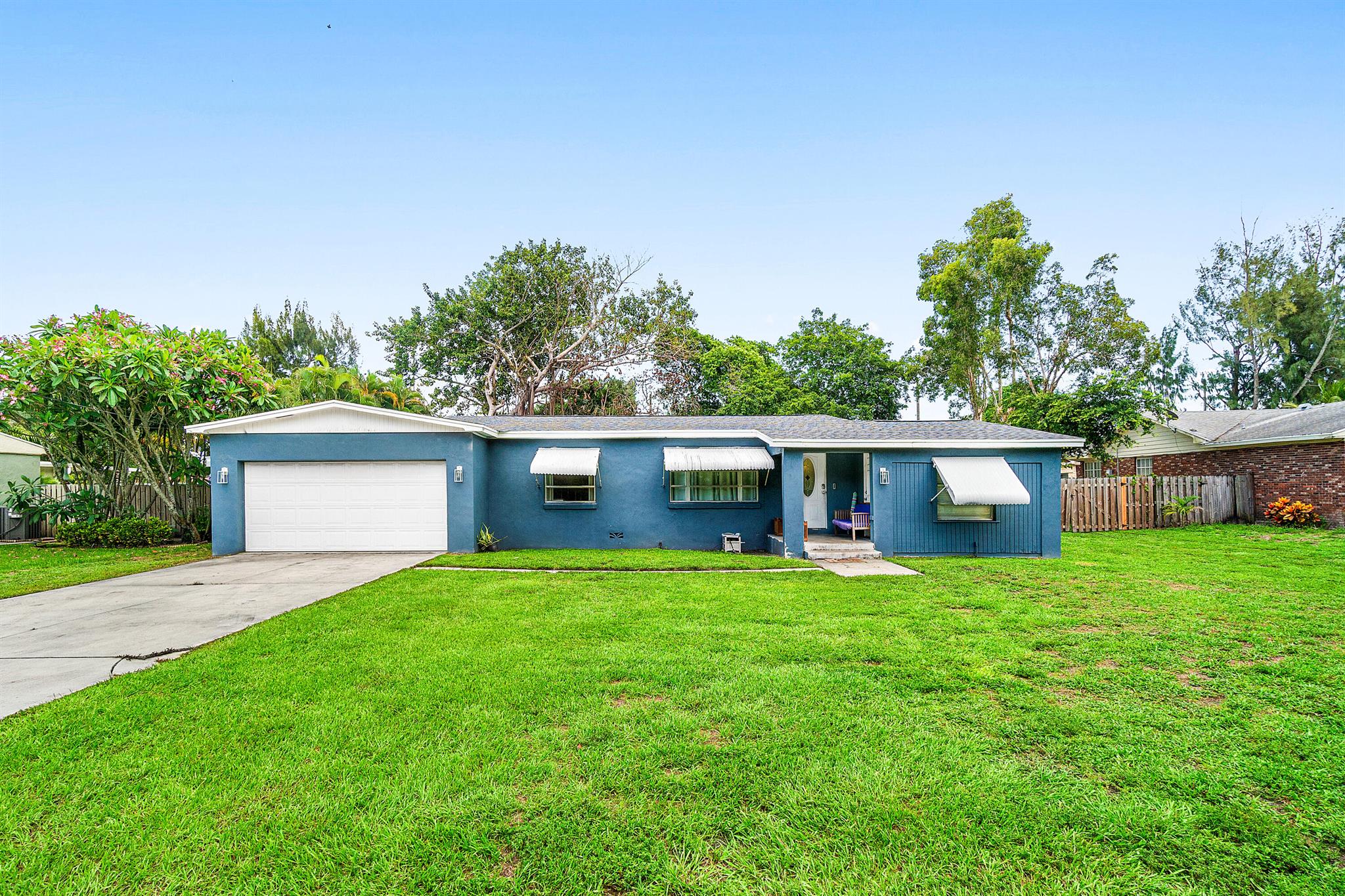 Discover your own private oasis in the heart of Palm Springs! Set on a quiet, friendly street, this home combines privacy, space, and flexibility rarely found in this area.This spacious property offers the freedom you've been looking for- with NO HOA, you can bring your boats, RVs, and toys with no restrictions.Step inside to find a well-maintained home filled with natural light and comfortable living areas perfect for family life. With a NEW ROOF installed July 2025 for your peace of mind. But the real star of the show is outside: Expansive outdoor space -- this .45 acre lot is perfect for creating your dream backyard retreat, adding a pool, or hosting unforgettable gatherings.Massive four-car garage -- ideal for car enthusiasts, hobbyists, or anyone needing ample storage