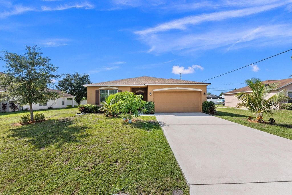Photo of 950 SW Longfellow Road, Port Saint Lucie, FL 34953 (MLS # R11085642)