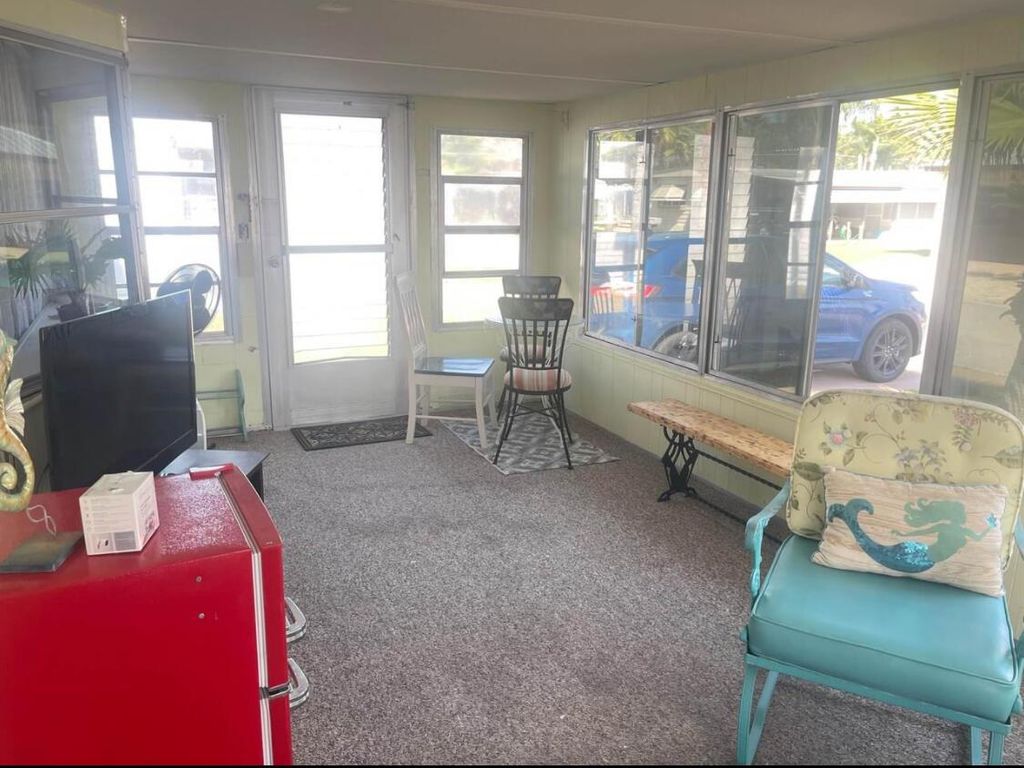 Photo of 11 SE Casa Rio Road, Port Saint Lucie, FL 34952 (MLS # R11035632)