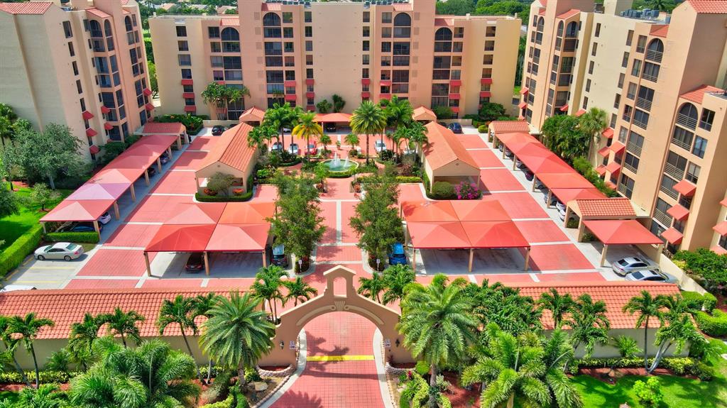 Beautifully updated, Turnkey condo with enclosed patios on both sides of unit.; 3rd BR is also used as a Den; stunning view of golf course, fantastic natural light and wide open feel. Gated community with resort style pool. THIS UNIT COMES WITH POOLSIDE CABANA (with bathroom); Club Membershio, optional; Covered assigned parking; Make appointment today! Will not last.