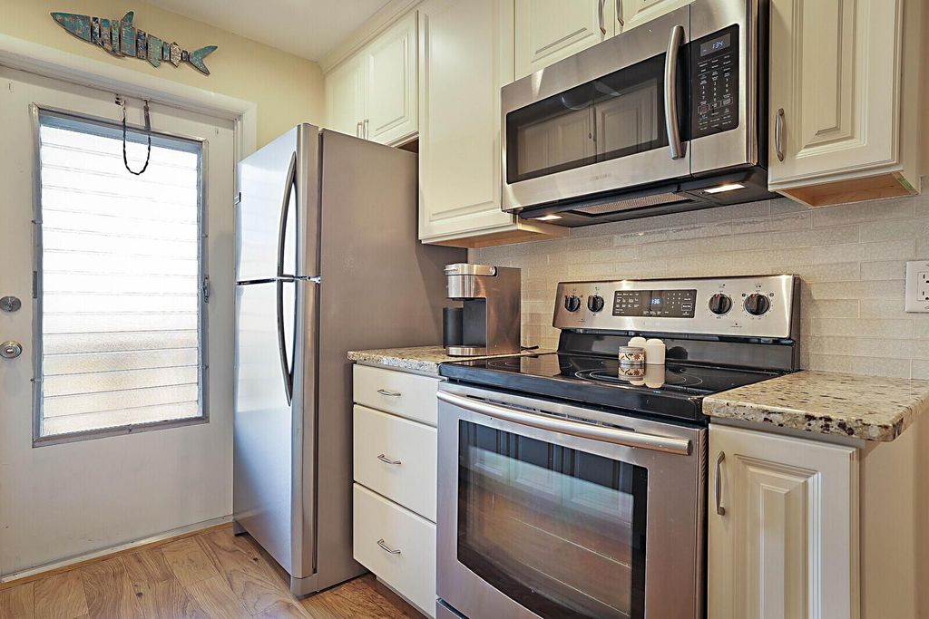 Photo of 112 Doolen Court #203, North Palm Beach, FL 33408 (MLS # R10950321)