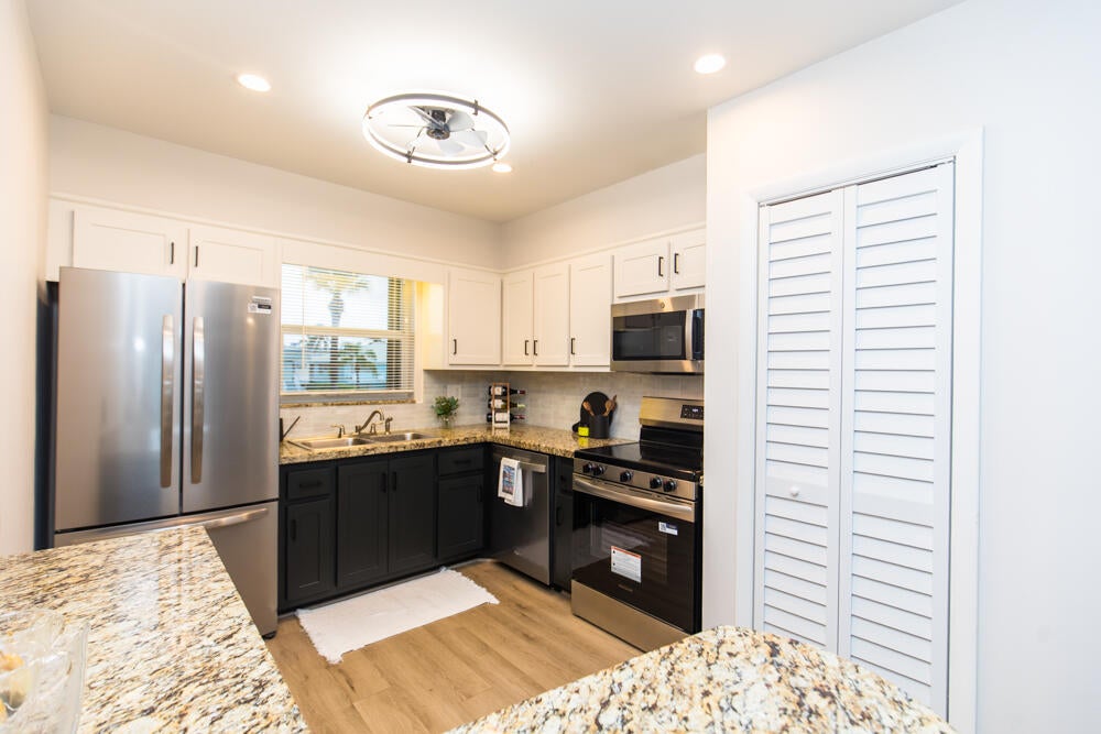 Photo of 110 Wettaw Lane #202, North Palm Beach, FL 33408 (MLS # B26032859)
