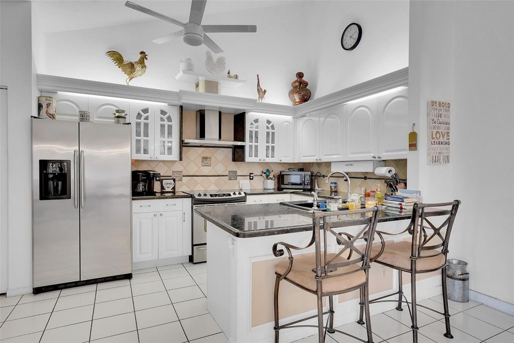 Photo of 1402 Timberlane Circle #14-B, Greenacres, FL 33463 (MLS # F10463522)