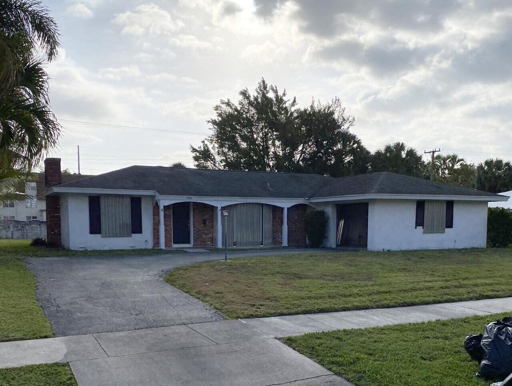 Photo of 744 Eastwind Drive Dr, North Palm Beach, FL 33408 (MLS # R10790407)