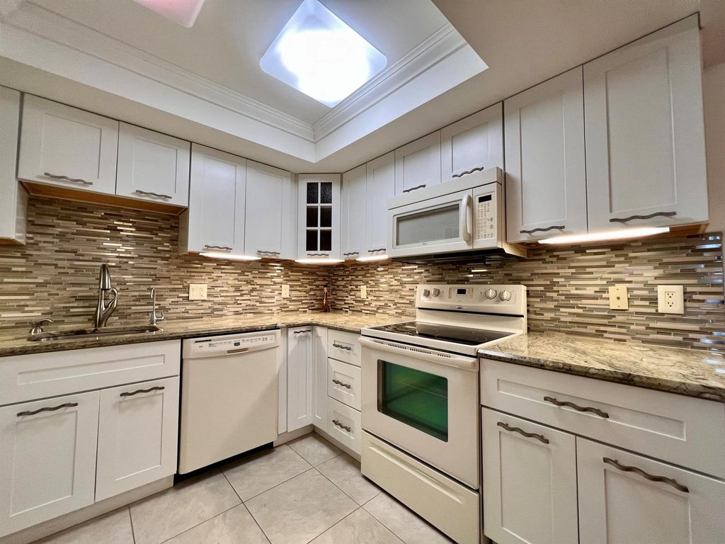 Photo of 208 Greenbrier C, West Palm Beach, FL 33417 (MLS # R10908814)