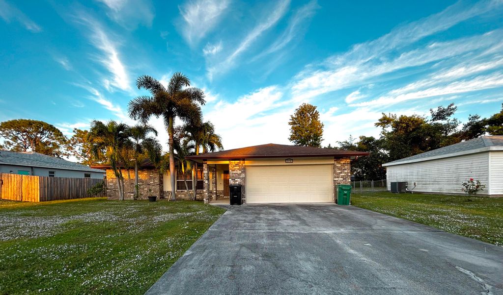 Photo of 1941 SE Aires Lane, Port Saint Lucie, FL 34984 (MLS # R11147451)