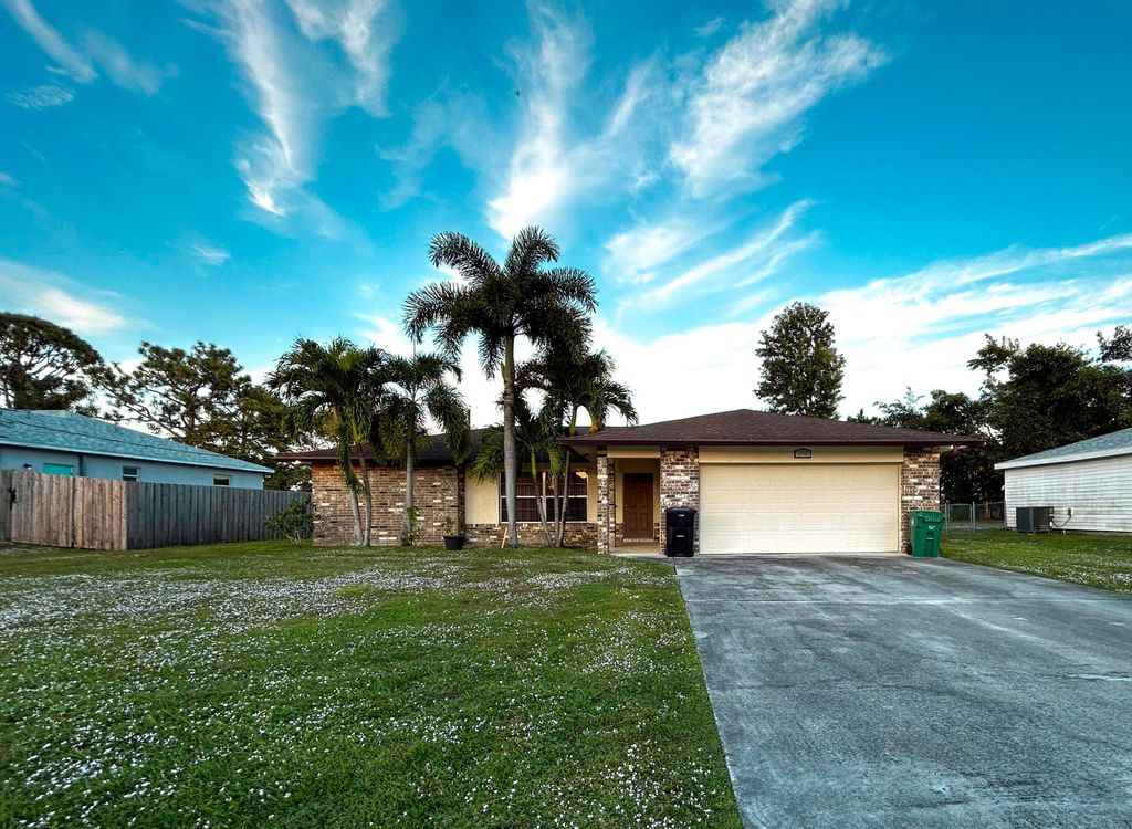 Photo of 1941 SE Aires Lane, Port Saint Lucie, FL 34984 (MLS # R11147451)