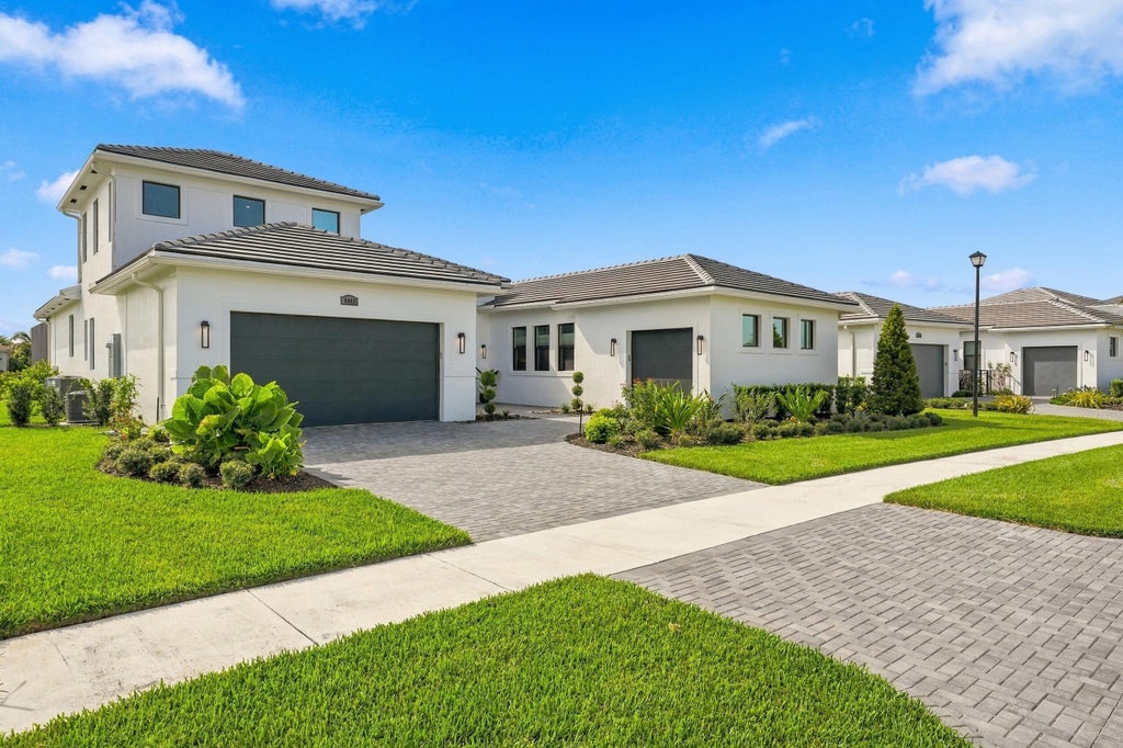 Photo of 8483 SW FELICITA Way, Port Saint Lucie, FL 34987 (MLS # B26081112)