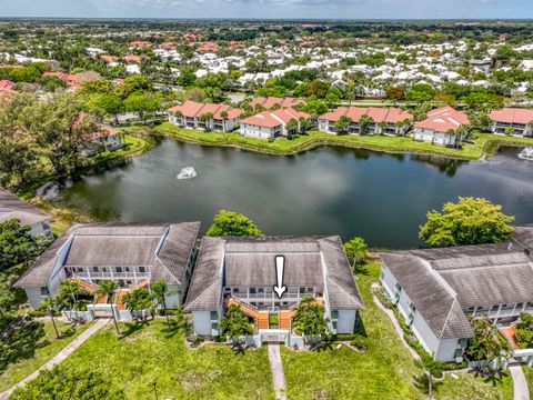 Photo of 170 Cypress Point Drive, Palm Beach Gardens, FL 33418 (MLS # B26021865)