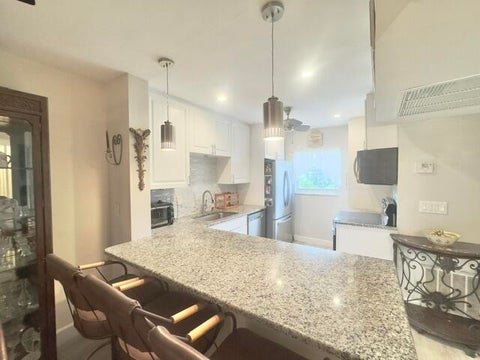Tiny photo for 2400 NE 16th Street #Unit 205, Pompano Beach, FL 33062 (MLS # B26036658)
