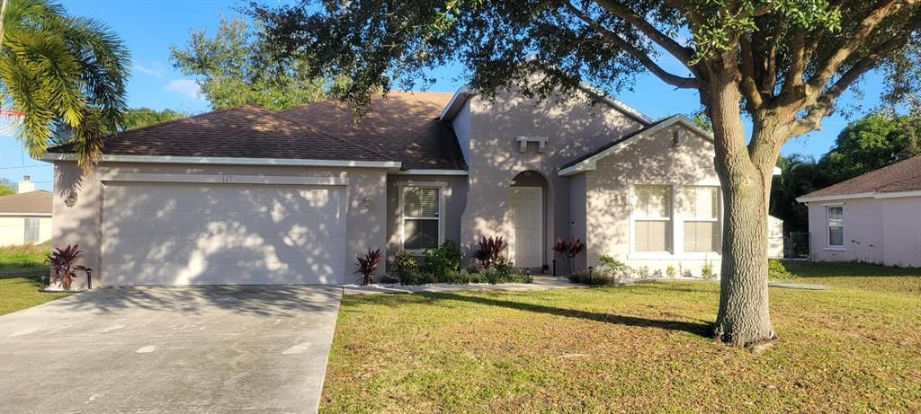 Photo of 117 NW Carmelite Street, Port Saint Lucie, FL 34983 (MLS # R10757635)