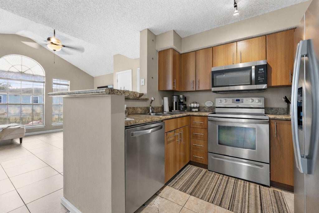 Photo of 1365 Crystal Way #H, Delray Beach, FL 33444 (MLS # R11159540)