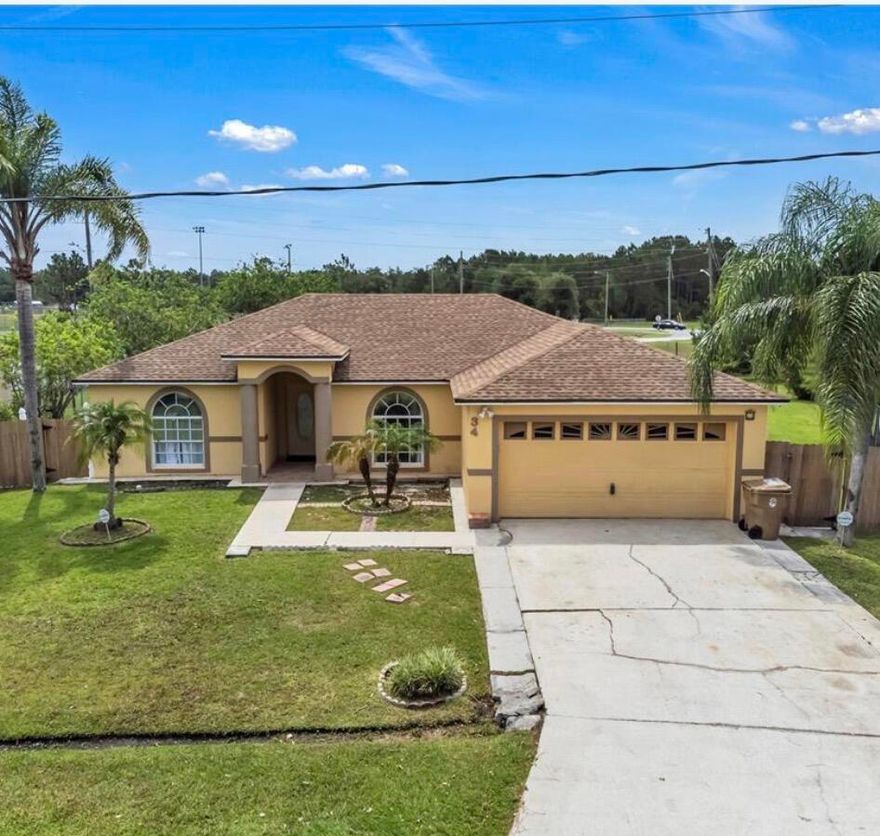 Welcome Home to 34 Bradford Court! Nestled on a generous 0.41-acre cul-de-sac lot in the heart of Poinciana, this charming 3-bedroom, 2-bathroom single-family home with bright, functional living space. Step inside to find soaring vaulted ceilings, a desirable split-bedroom floor plan, and sleek ceramic tile flooring throughout—no carpet here! The spacious kitchen flows seamlessly into the main living areas, making entertaining a breeze. Outside, enjoy ultimate privacy in your massive, fully fenced backyard, complete with a convenient rear storage shed. Plus, the low HOA fee covers your cable TV and high-speed internet! Don't miss this perfect blend of comfort, space, and convenience.   +1  Option 2: Bulleted & Easy to Scan (Best for quick reading)  Charming Move-In Ready
