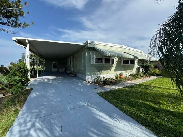 Photo of 31 Grande Vista Way, Port Saint Lucie, FL 34952 (MLS # B26043258)