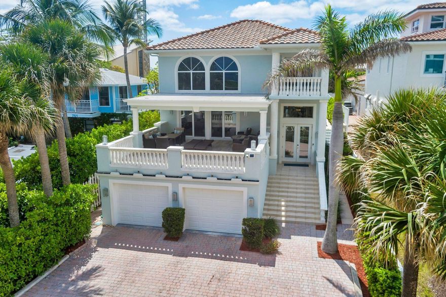 Your perfect winter Beach home. Spectacular 2 story CBS home on Ocean Drive in Juno Beach completely remodeled in 2021. Wake up to striking sunrises and relax on your front balcony overlooking the ocean. This home boasts a great room with soaring ceilings, a gourmet kitchen featuring an induction 36' Wolf range, built-in refrigerator, wall oven and microwave, bev cooler and island seating all with an ocean view. Primary and guest ensuite on first floor and 2 more ensuite bedrooms upstairs. All windows and doors are impact with porcelain tile throughout. The majestic staircase with glass railing accentuates the beauty of this home complete with an oversized 2 car garage and custom heated saltwater pool. Juno Beach living at its best. Golf, dining, baseball and beach it's all here.