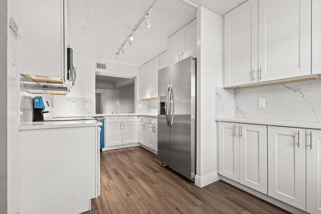 Photo of 23395 Carolwood Lane #207, Boca Raton, FL 33428 (MLS # R11139312)