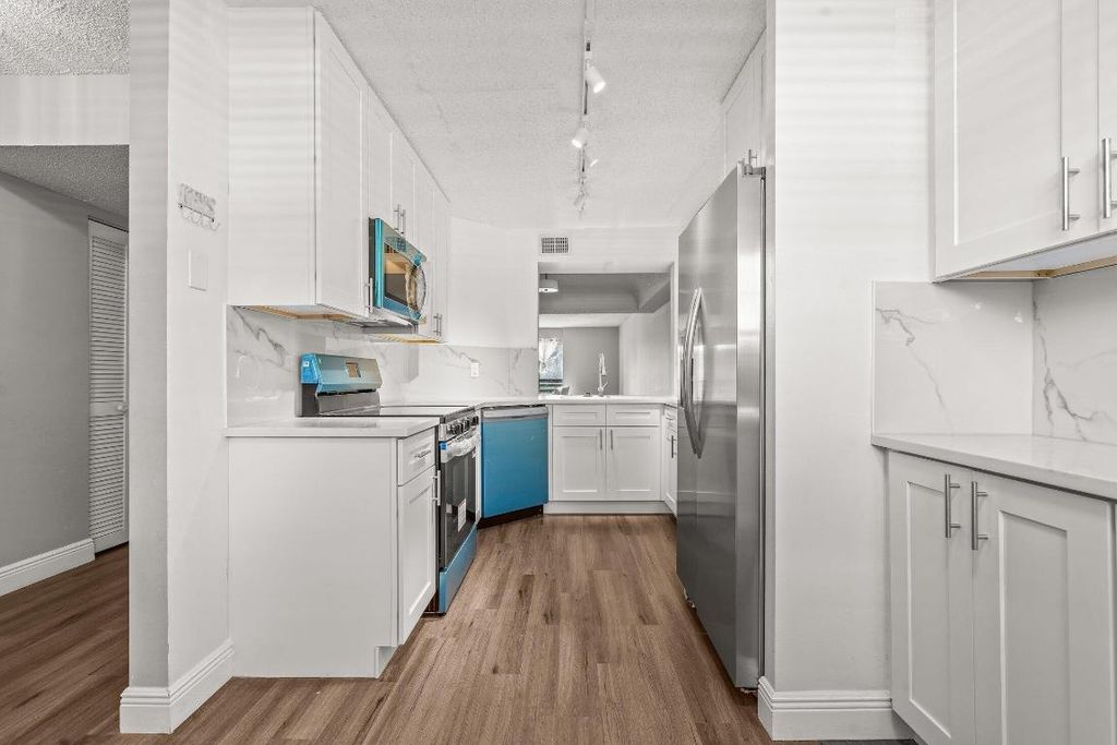Photo of 23395 Carolwood Lane #207, Boca Raton, FL 33428 (MLS # R11139312)