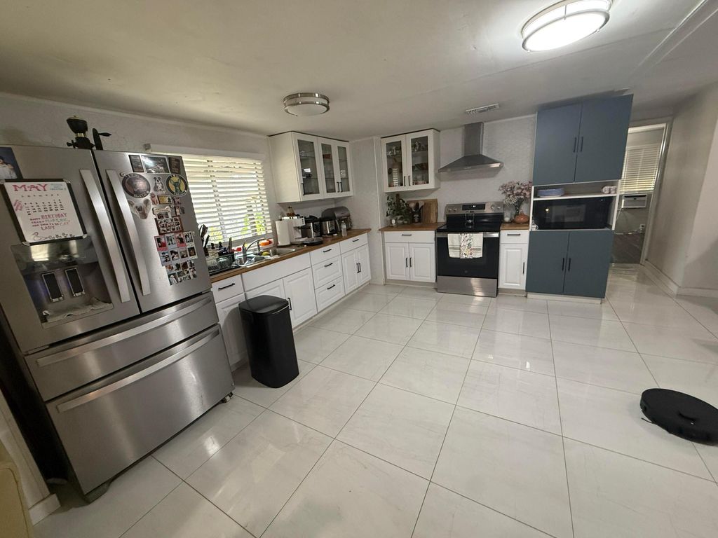 Photo of 2555 Pga Boulevard, Palm Beach Gardens, FL 33410 (MLS # B26024551)