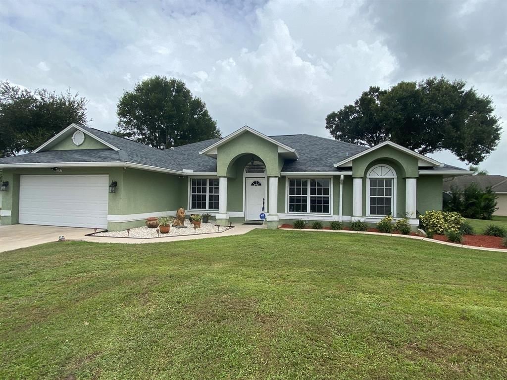 Photo of 1986 SW Notre Dame Avenue, Port Saint Lucie, FL 34953 (MLS # R10740521)