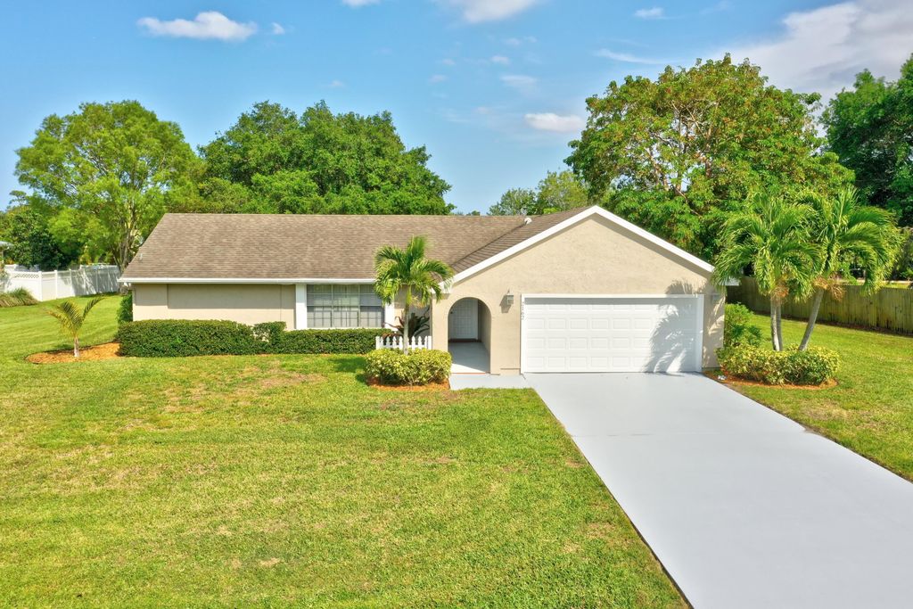 Photo of 2162 SE Abcor Road, Port Saint Lucie, FL 34952 (MLS # R10789181)