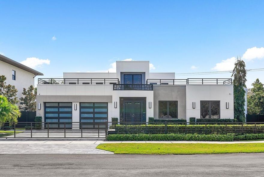 In the heart of Boca Raton, 200 NE 7th St offers an exquisite blend of luxury and convenience. This meticulously designed residence boasts modern elegance, featuring 6 bedrooms, 5.1 bathrooms, and a spacious open floor plan spread across 4,161 sq ft. Entertain in style with a Chefs kitchen, complete with high-end appliances. Retreat to the master suite oasis with a spa-like ensuite bath and walk-in closets. Enjoy Florida living at its finest with a private pool and lush landscaping. Minutes from pristine beaches, fine dining, and vibrant cultural attractions, this is coastal living redefined.