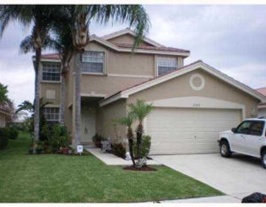 Location, Location!! Fabulous 4/2.5/2 on the lake single family home. Enjoy the huge family room with large kitchen and island. Fenced in yard with a great lake view. All 4 bedrooms upstairs.Beautiful master suite with tray ceilings & lake view. Tile through out first floor and laminate floors on 2nd floor. . Manned gate 24/7. Clubhouse with pool,exercise rm, vollyball ct, basketball ct, tennis ct, playground & more. lawncare & basic cable included with rent!