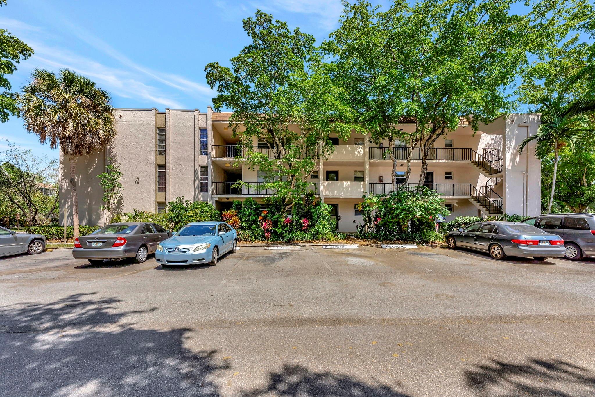 Cozy 2 bedroom, 2 bath condo features new wood laminate floors and updated kitchen with pass through to dining area. Tiled & screened balcony. Building passed its 40 year inspection. Sparkling community pool! Great location in the center of Plantation. Bus stop across the street. Near I-595, malls, and dining establishments. Small pets allowed. Must own 1 year before renting. Nice unit! Don't miss it!