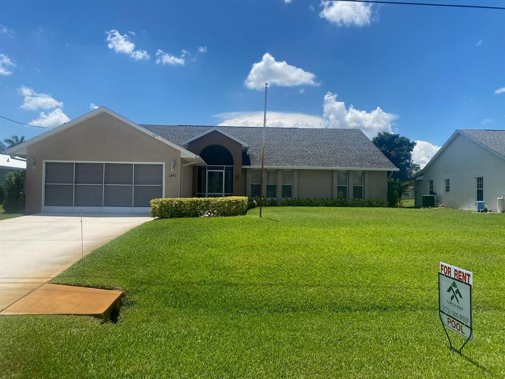 Photo of 2642 SW Monterrey Lane, Port Saint Lucie, FL 34953 (MLS # R10823626)