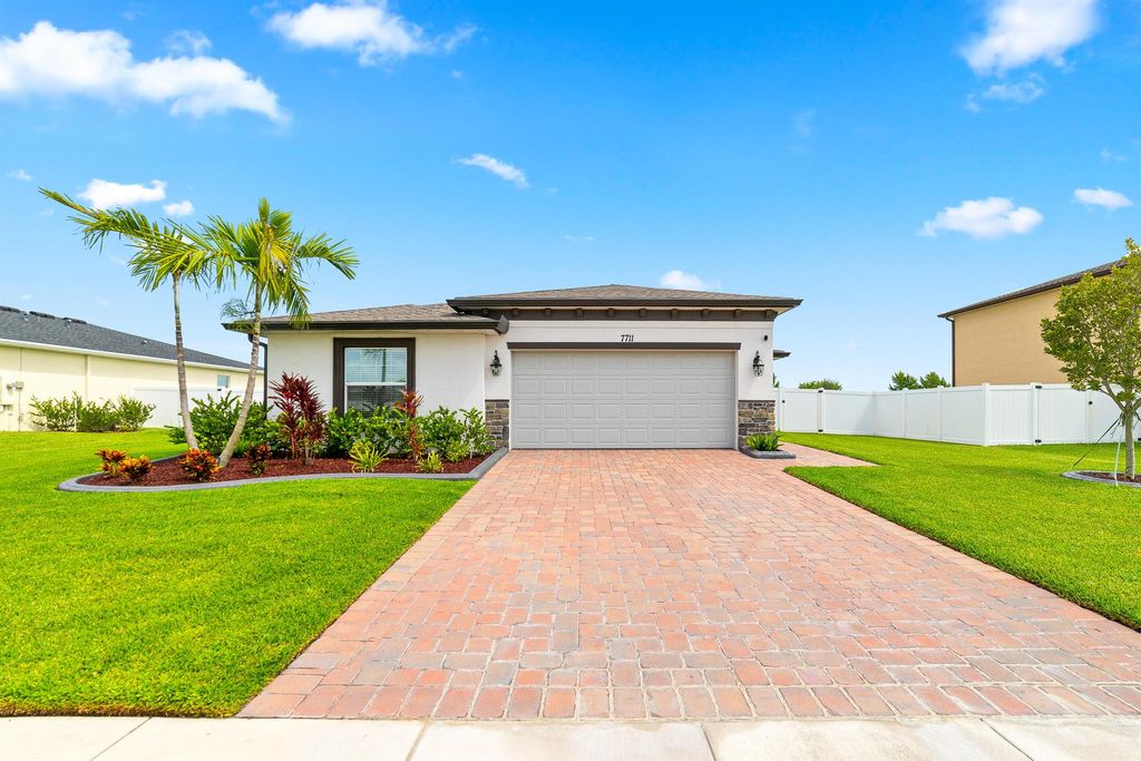 Photo of 7711 NW Old Grove Lane, Port St Lucie, FL 34987 (MLS # R10912034)