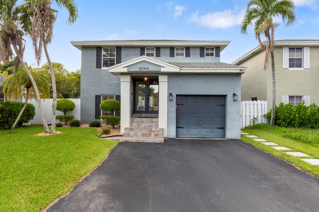 Photo of 5799 WOODLAND POINT Drive, Tamarac, FL 33319 (MLS # B26058816)