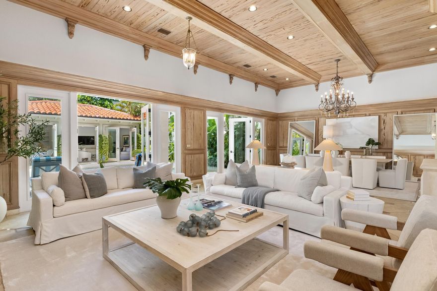 New roof just installed! Located on the beach block in the heart of Midtown Palm Beach, 175 Sunset Avenue has undergone extensive renovations and offers a rare opportunity to own a property with unusually high elevation for Palm Beach (11'2'') in one of the island's most sought-after locations. This stunning 4-bedroom, 5-bathroom townhome features a dramatic 34+ foot long living and dining room with soaring 14-foot coffered Pecky Cypress ceilings, creating an extraordinary sense of scale and grandeur unlike anything on the market currently. Newly renovated kitchen and bathrooms add a fresh, modern touch to the home. A separate guest house—an uncommon find in Midtown Palm Beach—includes a fully updated kitchen and bath, ideal for hosting guests with comfort and privacy. Additional highlights include a private library, an elevator, a secluded pool designed for peaceful outdoor living, a full-house generator, and impact windows and doors.

Just moments from the beach, the Lake Trail and The Royal Poinciana Plaza, this home offers the privacy of a single-family residence with the convenience of a townhome.