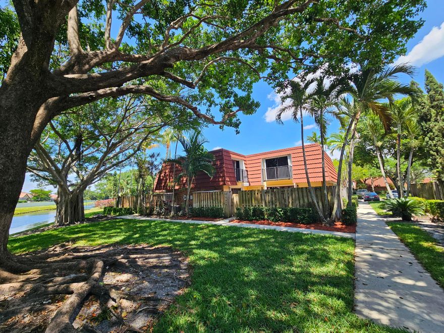 2 bedroom, 2.5 bath corner unit townhome with tranquil & picturesque canal views. Located in Prestigious Jacaranda. Updated kitchen with stainless steel appliances. Ceramic floors throughout.  Spacious master bedroom with serene canal views. Updated master shower. Walk-in closet. Laminated wood floors in bedrooms. Newer a/c unit. Accordion shutters on both balconies & throughout. Fenced-in tiled patio perfect for outdoor entertaining. Storage space. Footsteps away from the swimming pool. 2 assigned parking spaces + guests parking. Pets allowed. Corporate buyers okay. On-site management. Can be rented immediately. All ages community.