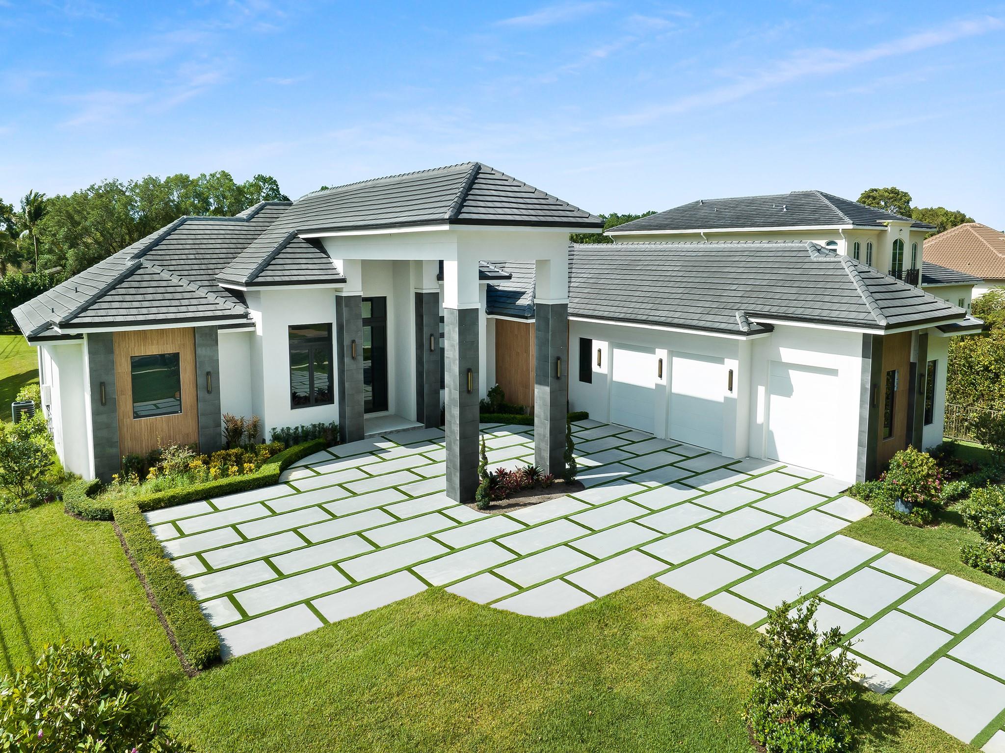 Welcome to this stunning modern new construction home located in Davie, FL. Situated on an expansive acre lot, this luxurious property offers an impressive blend of space and sophistication. This home boasts six bedrooms plus an exercise room, providing ample room for both relaxation and productivity. With 5.5 bathrooms, including a primary suite with a lavish en-suite bathroom, every aspect of this home exudes contemporary elegance. The over an acre lot presents the perfect opportunity to create your private oasis with plenty of space for a pool. The inclusion of a wine closet adds a touch of sophistication, perfect for entertaining guests. Some photos have been virtually staged..Don't miss the chance to make this masterpiece your own!