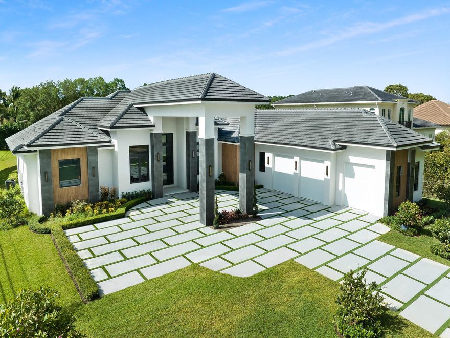 Welcome to this stunning modern new construction home located in Davie, FL. Situated on an expansive acre lot, this luxurious property offers an impressive blend of space and sophistication. This home boasts six bedrooms plus an exercise room, providing ample room for both relaxation and productivity. With 5.5 bathrooms, including a primary suite with a lavish en-suite bathroom, every aspect of this home exudes contemporary elegance. The over an acre lot presents the perfect opportunity to create your private oasis with plenty of space for a pool. The inclusion of a wine closet adds a touch of sophistication, perfect for entertaining guests. Some photos have been virtually staged..Don't miss the chance to make this masterpiece your own!