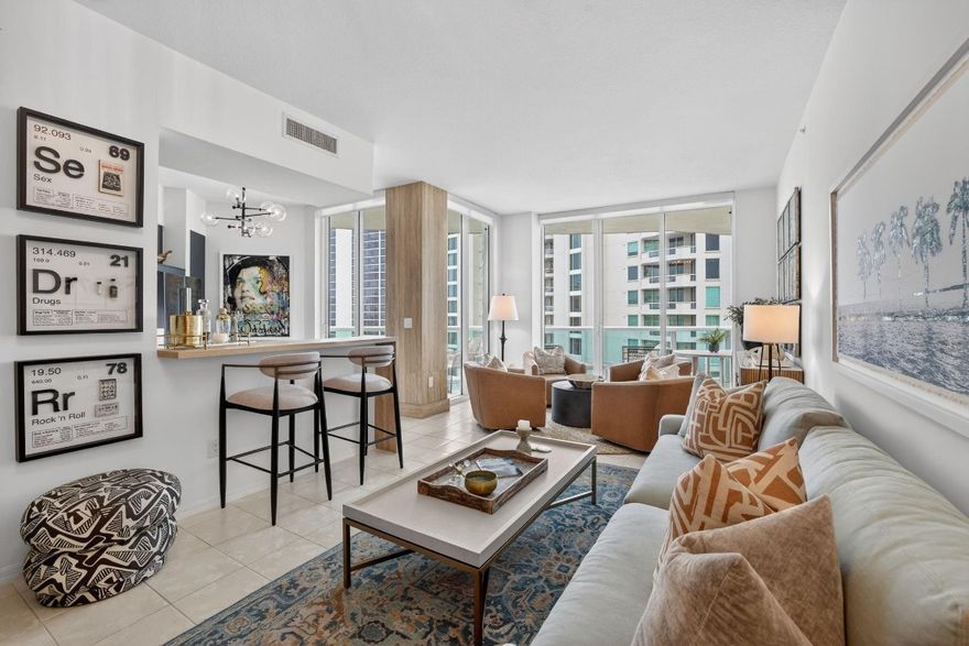 WATERGARDEN PENTHOUSE PH6 | RENOVATED 2022 | FULLY FURNISHED: Rare penthouse opportunity at Watergarden with 270-degree unobstructed views: Ocean, Intracoastal, City, and New River. 10 Foot ceilings, floor-to-ceiling glass, and east and northeast-facing exposures maximize natural light throughout. Completely renovated in 2022 with coastal chic finishes, custom built-ins, and a designer furniture package included. Move-in ready—no updates needed. 5-star full-service lifestyle offering: 24-hour valet/security, concierge, tropical pool deck with hot tub, two-story gym, clubroom, business center, movie theater with scheduled showings, and pet-friendly accommodations — all within walking distance of restaurants, shops, art events, and Publix on famous Las Olas Blvd. 2025 HVAC and more!