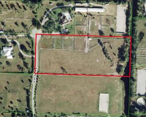 Fantastic location on cul-de-sac in White Fences. This 5 acre lot is perfect for you to build your dream farm!