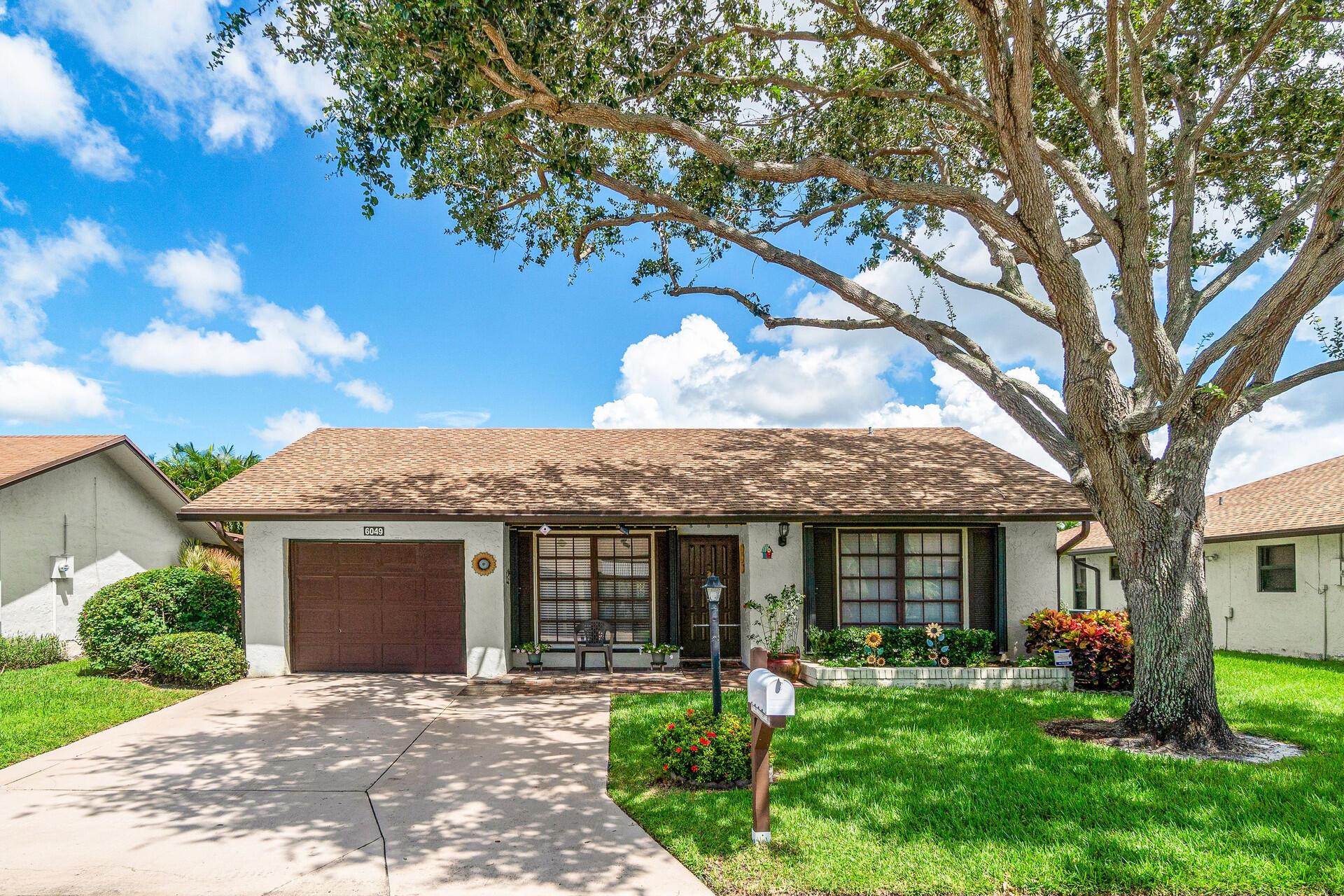Looking for a home where the remodeling has already been done for you? Look no further! This Tastefully Remodeled 2 Bd/ 2 Ba/ 1 Car Garage in a well-maintained 55+ community is Move In Ready! As you enter this home you will notice the vaulted ceilings and open floor plan in the Living Room and Dining Room. Your eyes will be drawn to the beautiful 12 x 23'' lanai that is both screened in AND offers Plexi-Glass sliders. Entertain your guests in the screened area during the winter or close the sliders and use a portable A/C to keep guests comfortable in the summertime. This home boasts Beautiful 20'' neutral tile THROUGHOUT the home and a convenient split bedroom plan. Spacious Master Bedroom with walk-in closet as well as spacious 2nd bedroom. The kitchen has ***see next page***