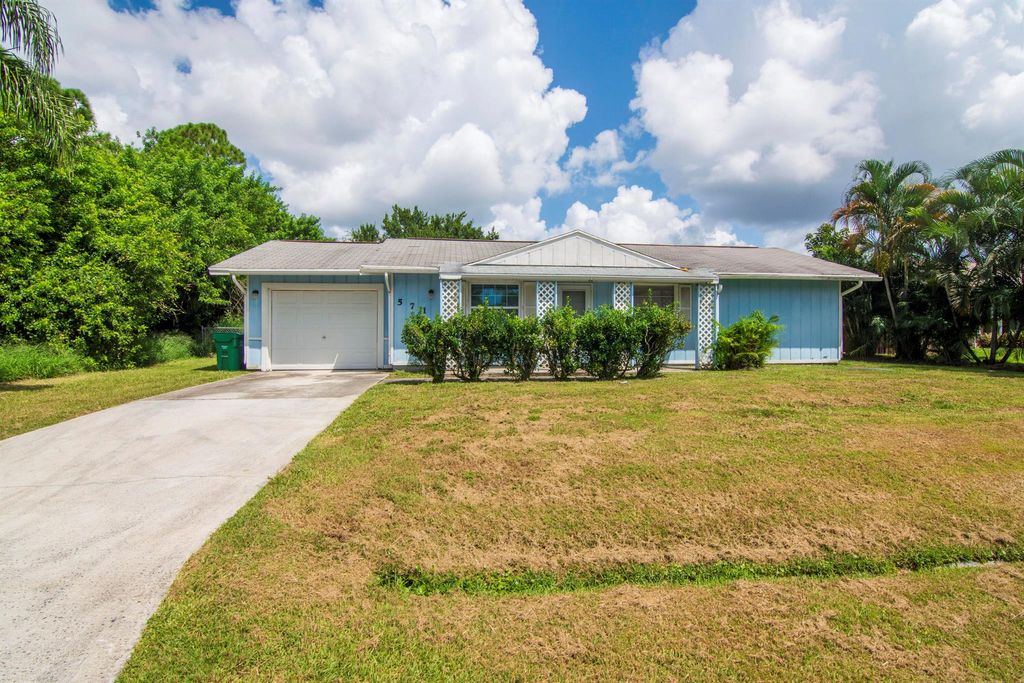 Photo of 571 SW Comet Terrace, Port St Lucie, FL 34953 (MLS # R10913011)