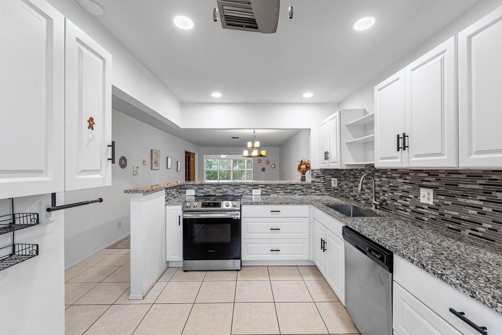 Photo of 2638 Gately Drive E #125, West Palm Beach, FL 33415 (MLS # B26042325)